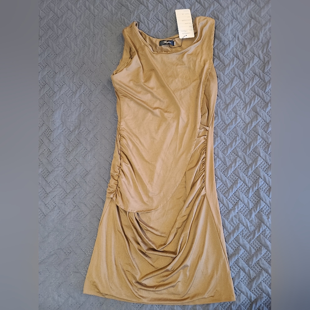 Nude/tan dress.